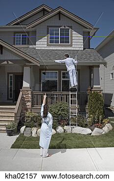 Picture - young couple doing 
housework in pajamas. 
fotosearch - search 
stock photos, 
pictures, images, 
and photo clipart