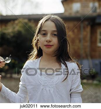 Stock Photography - young girl posing. 
fotosearch - search 
stock photos, 
pictures, images, 
and photo clipart