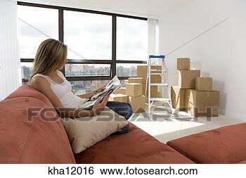 Stock Photo - young woman reading. 
fotosearch - search 
stock photos, 
pictures, images, 
and photo clipart