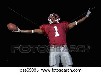 Stock Image - african football 
player arms outstretched. 
fotosearch - search 
stock photos, 
pictures, images, 
and photo clipart