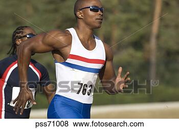Stock Photo - african male athletes 
running race. 
fotosearch - search 
stock photos, 
pictures, images, 
and photo clipart