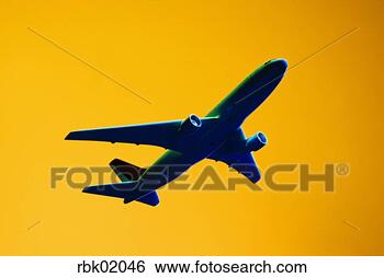 Stock Photo - airplane flying. 
fotosearch - search 
stock photos, 
pictures, images, 
and photo clipart