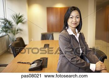 Stock Photography - asian businesswoman 
in conference 
room. fotosearch 
- search stock 
photos, pictures, 
images, and photo 
clipart