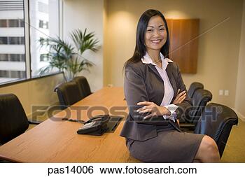 Stock Photo - asian businesswoman 
in conference 
room. fotosearch 
- search stock 
photos, pictures, 
images, and photo 
clipart