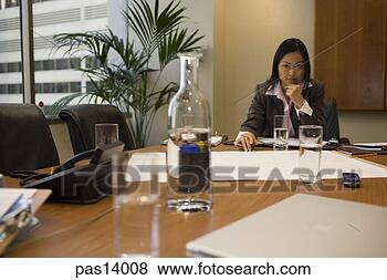 Stock Photo - asian businesswoman 
working at conference 
table. fotosearch 
- search stock 
photos, pictures, 
images, and photo 
clipart