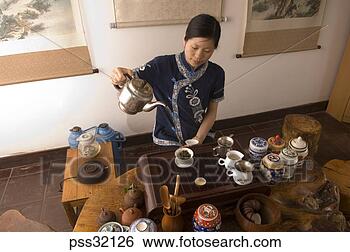 Stock Photo - asian woman preparing 
tea ceremony, 
guilin, china. 
fotosearch - search 
stock photos, 
pictures, images, 
and photo clipart