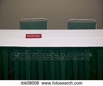 Stock Photo - banquet table 
with reserved 
sign. fotosearch 
- search stock 
photos, pictures, 
images, and photo 
clipart
