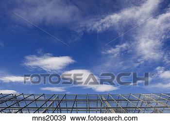 Stock Photograph - blue sky and roof 
of a green house, 
iceland. fotosearch 
- search stock 
photos, pictures, 
images, and photo 
clipart