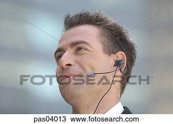 Stock Photo - businessman in 
headset. fotosearch 
- search stock 
photos, pictures, 
images, and photo 
clipart