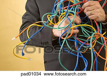 Stock Photo - businessman holding 
tangled wires. 
fotosearch - search 
stock photos, 
pictures, images, 
and photo clipart