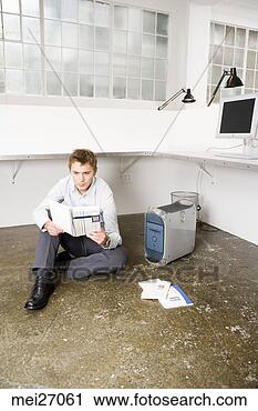 Stock Photography - businessman sitting 
on floor next 
to computer. fotosearch 
- search stock 
photos, pictures, 
images, and photo 
clipart