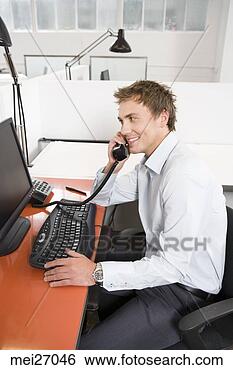 Stock Photo - businessman talking 
on telephone. 
fotosearch - search 
stock photos, 
pictures, images, 
and photo clipart