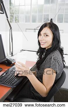 Stock Photograph - businesswoman 
drinking takeout 
coffee. fotosearch 
- search stock 
photos, pictures, 
images, and photo 
clipart