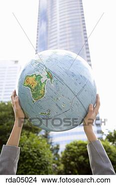 Stock Photo - businesswoman 
holding globe. 
fotosearch - search 
stock photos, 
pictures, images, 
and photo clipart