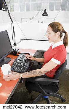 Stock Photo - businesswoman 
holding takeout 
coffee. fotosearch 
- search stock 
photos, pictures, 
images, and photo 
clipart