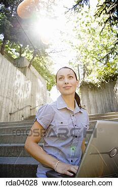Stock Photo - businesswoman 
typing on laptop. 
fotosearch - search 
stock photos, 
pictures, images, 
and photo clipart