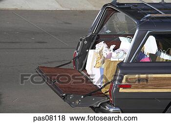 Stock Photo - car full of shopping 
bags. fotosearch 
- search stock 
photos, pictures, 
images, and photo 
clipart