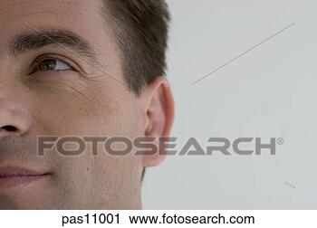 Stock Photography - close up of man’s 
face. fotosearch 
- search stock 
photos, pictures, 
images, and photo 
clipart