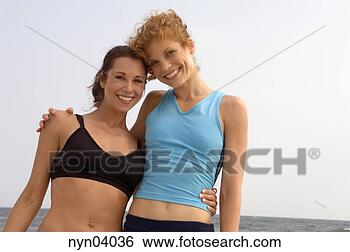 Stock Photo - close-up of two 
women on beach. 
fotosearch - search 
stock photos, 
pictures, images, 
and photo clipart