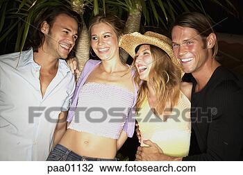 Stock Photo - couples hugging 
and laughing. 
fotosearch - search 
stock photos, 
pictures, images, 
and photo clipart