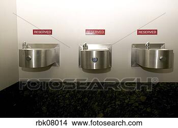 Stock Photo - drinking fountains 
with reserved 
signs. fotosearch 
- search stock 
photos, pictures, 
images, and photo 
clipart
