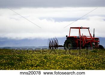 Stock Photo - empty tractor 
in meadow, iceland. 
fotosearch - search 
stock photos, 
pictures, images, 
and photo clipart