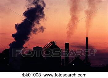 Stock Photo - factory smokestacks 
at sunset. fotosearch 
- search stock 
photos, pictures, 
images, and photo 
clipart