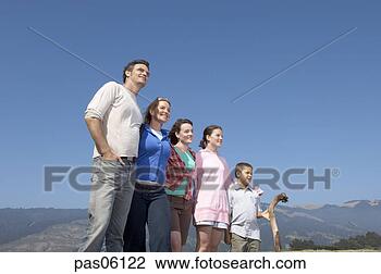 Stock Photo - family posing 
in wilderness. 
fotosearch - search 
stock photos, 
pictures, images, 
and photo clipart