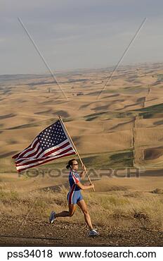 Stock Photo - female athlete 
with american 
flag on roadside. 
fotosearch - search 
stock photos, 
pictures, images, 
and photo clipart