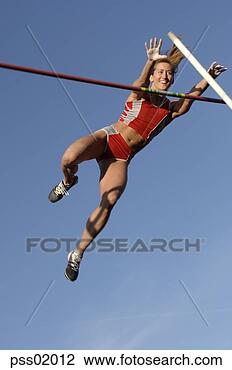 Stock Photo - female athlete 
pole vaulting. 
fotosearch - search 
stock photos, 
pictures, images, 
and photo clipart