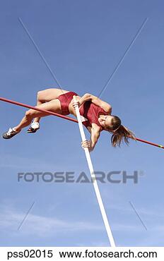 Stock Image - female athlete 
pole vaulting. 
fotosearch - search 
stock photos, 
pictures, images, 
and photo clipart