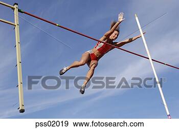 Stock Photograph - female athlete 
pole vaulting. 
fotosearch - search 
stock photos, 
pictures, images, 
and photo clipart
