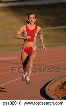 Stock Photography - female athlete 
running on track. 
fotosearch - search 
stock photos, 
pictures, images, 
and photo clipart