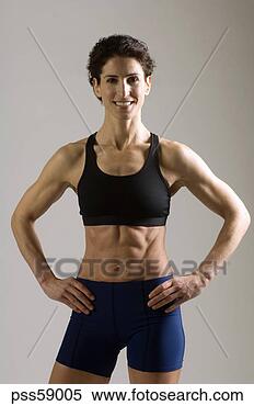 Stock Image - female athlete 
smiling. fotosearch 
- search stock 
photos, pictures, 
images, and photo 
clipart
