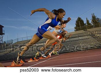 Stock Photo - female athletes 
running on track. 
fotosearch - search 
stock photos, 
pictures, images, 
and photo clipart