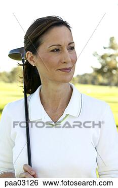 Stock Photo - female golfer. 
fotosearch - search 
stock photos, 
pictures, images, 
and photo clipart