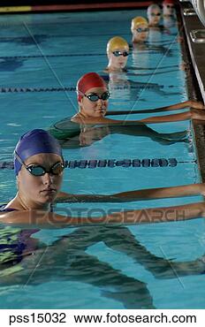 Stock Photo - female swimmers 
preparing for 
competitive race. 
fotosearch - search 
stock photos, 
pictures, images, 
and photo clipart