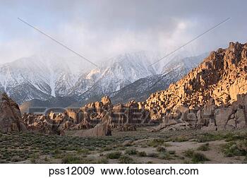 Stock Photograph - fog over mountain 
range. fotosearch 
- search stock 
photos, pictures, 
images, and photo 
clipart