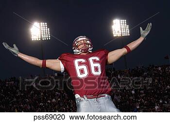 Stock Photography - football player 
with arms outstretched. 
fotosearch - search 
stock photos, 
pictures, images, 
and photo clipart