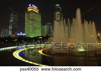 Stock Image - fountain and urban 
buildings in people's 
park, shanghai, 
china. fotosearch 
- search stock 
photos, pictures, 
images, and photo 
clipart