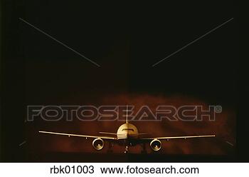 Stock Photo - front view of 
an airplane. fotosearch 
- search stock 
photos, pictures, 
images, and photo 
clipart