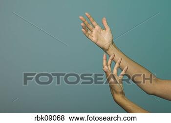 Stock Photo - hands reaching 
upward. fotosearch 
- search stock 
photos, pictures, 
images, and photo 
clipart