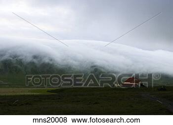 Stock Photo - low clouds over 
farmhouse, iceland. 
fotosearch - search 
stock photos, 
pictures, images, 
and photo clipart