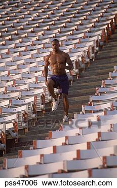 Stock Photo - male athlete running 
down stadium stairs. 
fotosearch - search 
stock photos, 
pictures, images, 
and photo clipart