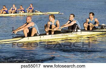 Picture - male athletes 
rowing in canal. 
fotosearch - search 
stock photos, 
pictures, images, 
and photo clipart