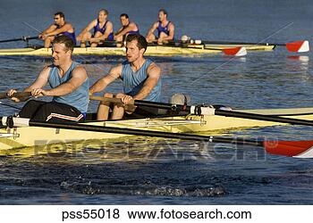 Stock Photo - male athletes 
rowing in canal. 
fotosearch - search 
stock photos, 
pictures, images, 
and photo clipart