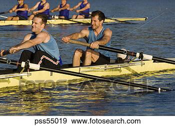 Stock Photograph - male athletes 
rowing in canal. 
fotosearch - search 
stock photos, 
pictures, images, 
and photo clipart