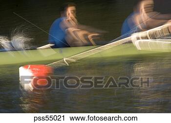 Stock Photography - male athletes 
rowing on water. 
fotosearch - search 
stock photos, 
pictures, images, 
and photo clipart