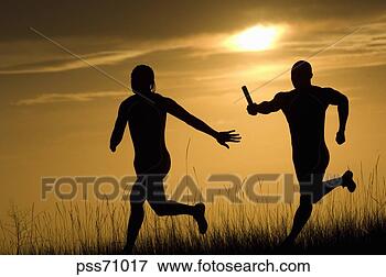 Picture - male athletes 
running in relay 
race. fotosearch 
- search stock 
photos, pictures, 
images, and photo 
clipart