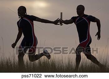 Stock Photo - male athletes 
running in relay 
race. fotosearch 
- search stock 
photos, pictures, 
images, and photo 
clipart